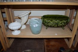 POTTERY VASES AND AN ART GLASS VASE WITH A SWIRLING BLUE DESIGN