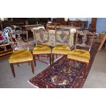 Set of four late 19th century mahogany dining chairs^ pierced vase shaped splat backs and mustard