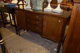 MODERN SERPENTINE SHAPED SIDEBOARD WITH THREE CENTRAL DRAWERS AND LARGER DRAWERS EITHER SIDE,
