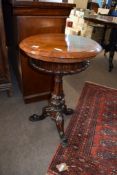 Early 19th century rosewood pedestal work table of circular form raised on a fluted column