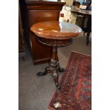 Early 19th century rosewood pedestal work table of circular form raised on a fluted column