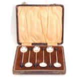 Cased set of six George V bean end coffee spoons within the original fitted case, Birmingham 1931 by