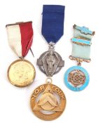 Group of Masonic medals including two silver gilt examples, the first circular shaped with triangle,
