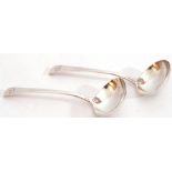 Pair of George III Old English pattern silver sauce ladles, each engraved with a leopard, having