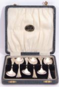 Cased set of six George V coffee spoons in trefid and rat tail pattern, Sheffield 1924 by C W