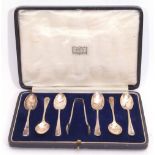 Cased set of six George V coffee spoons in Hanoverian pattern, together with the matching sugar