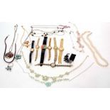 Four boxes of costume jewellery and ladies wristwatches to include necklaces, faux pearls etc