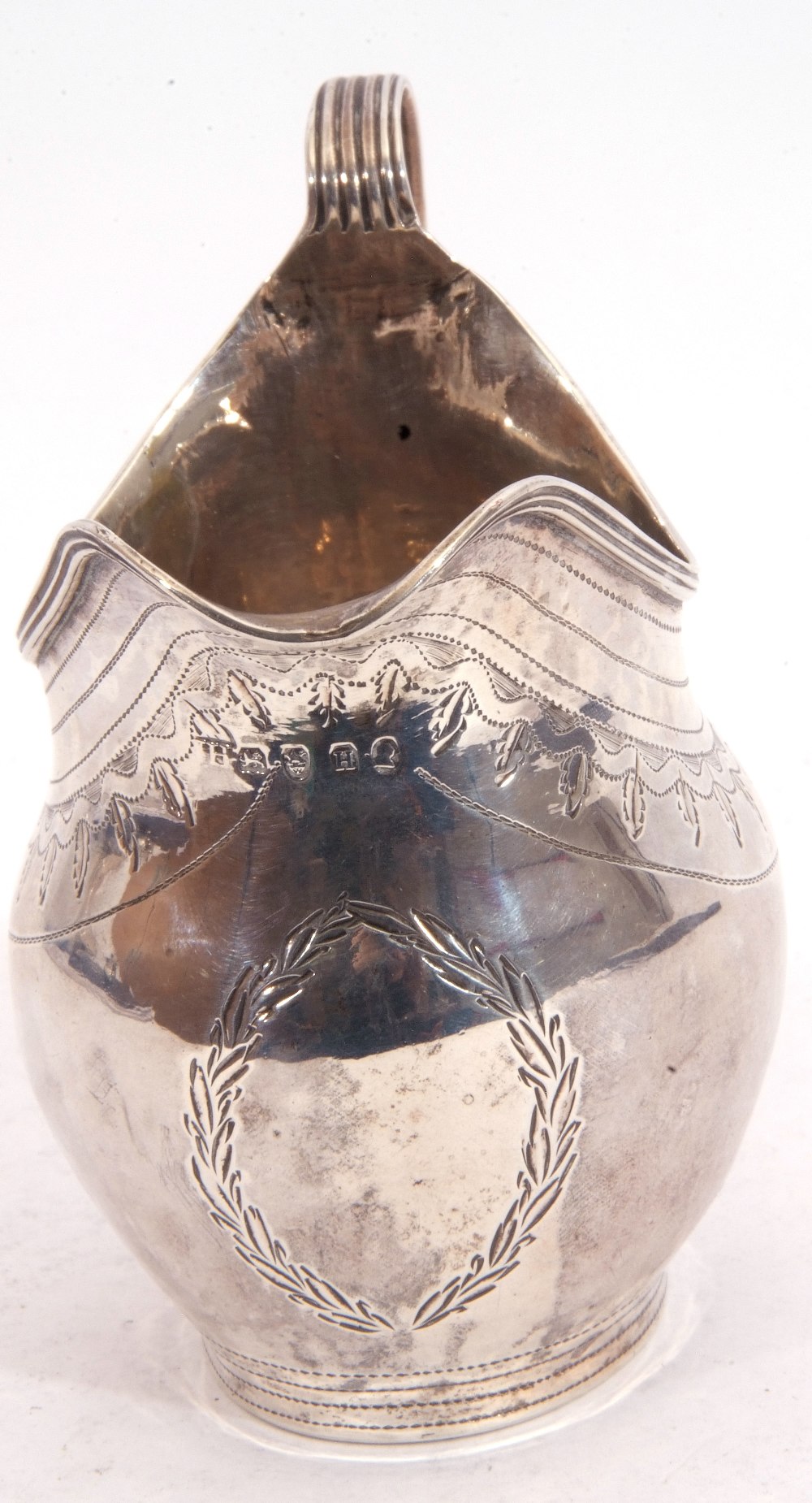 George III silver cream jug, the body with a vacant cartouche, an encircling band of foliate - Image 4 of 4