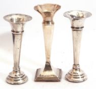 Group of three small early 20th century silver specimen vases with loaded bases including a pair,