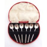 Cased set of six George VI egg spoons with chevron embossed pointed ends to handle, Sheffield 1938