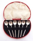 Cased set of six George VI egg spoons with chevron embossed pointed ends to handle, Sheffield 1938