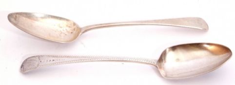 George III bright cut Old English table spoon, London 1797, maker WE, and a further plain Old