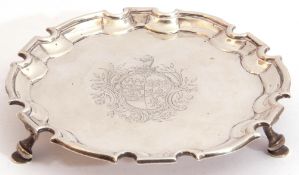 George III silver salver by Joseph Sanders London 1734, of shaped circular form, raised pie crust