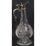 Elizabeth II silver mounted cut glass claret jug, the decorative scroll handle with a beast thumb