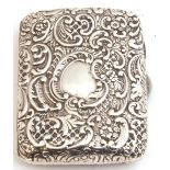 Victorian silver repousse cigarette case of rectangular form decorated both sides with scrolls,