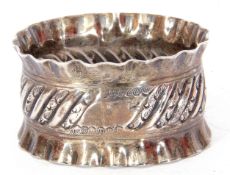 Victorian silver napkin ring of oval form, chased decorated with crimped edges, Sheffield 1893,