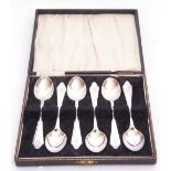 Cased set of six George V coffee spoons in dog nose pattern, bearing initial "D" to handle,