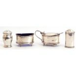 George V three piece silver cruet set of oval form comprising a mustard and liner with hinged lid,