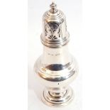 George V silver caster of plain baluster form with pull off cover, pierced with scroll work and