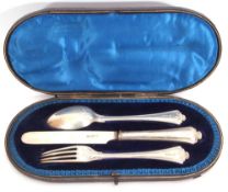 Late Victorian cased three-piece christening set of reeded pattern with foliate ends, comprising