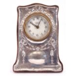 Edward VII silver mounted mantel clock, the dial printed "Maxwal, made in Germany", the silver front