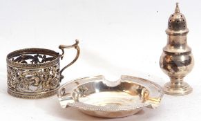 Mixed Lot: circular ash tray with straight gadrooned edge, Sheffield 1962, a silver gilt glass