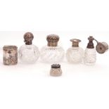 Mixed Lot: two spherical cut glass scent bottles with hinged, push on lids, Birmingham 1898,
