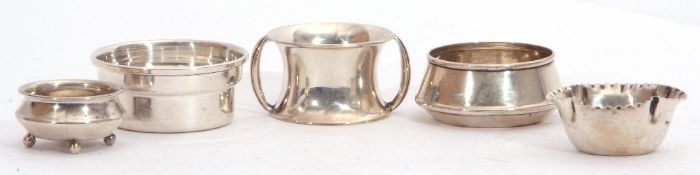 Group comprising three assorted hallmarked circular etc salts, a sterling example and a hallmarked