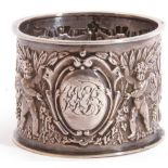 Late Victorian Scottish napkin ring, well embossed with putti, quiver and torches etc, 5cm diam,