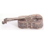 Edwardian import hallmarked lidded box in the form of a miniature cello, chased and embossed with