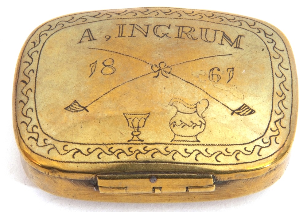 Victorian brass snuff box of shaped rectangular form, the hinged lid engraved with "A Ingrum", dated