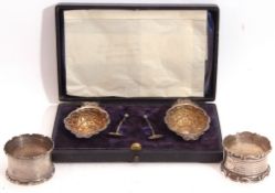 Mixed Lot: cased pair of late Victorian embossed oval two-handled salts with the remains of gilt