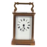 First quarter of 20th century French brass and glass cased carriage timepiece of usual form,