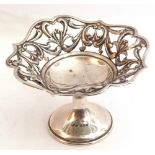 Edward VII silver pedestal dish, a pierced scroll design to a plain circular bowl on a spreading