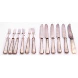 Set of six George V silver handled fruit forks with plated prongs, together with five matching