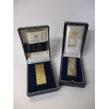 Two cased Dunhill Lighters