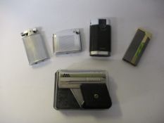 Selection of five various Lighters, including Imco Gunlite