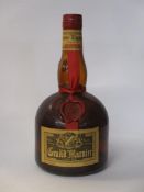 Grand Marnier (old bottle) 23 1/4 fl oz (level base of neck), 67' Proof