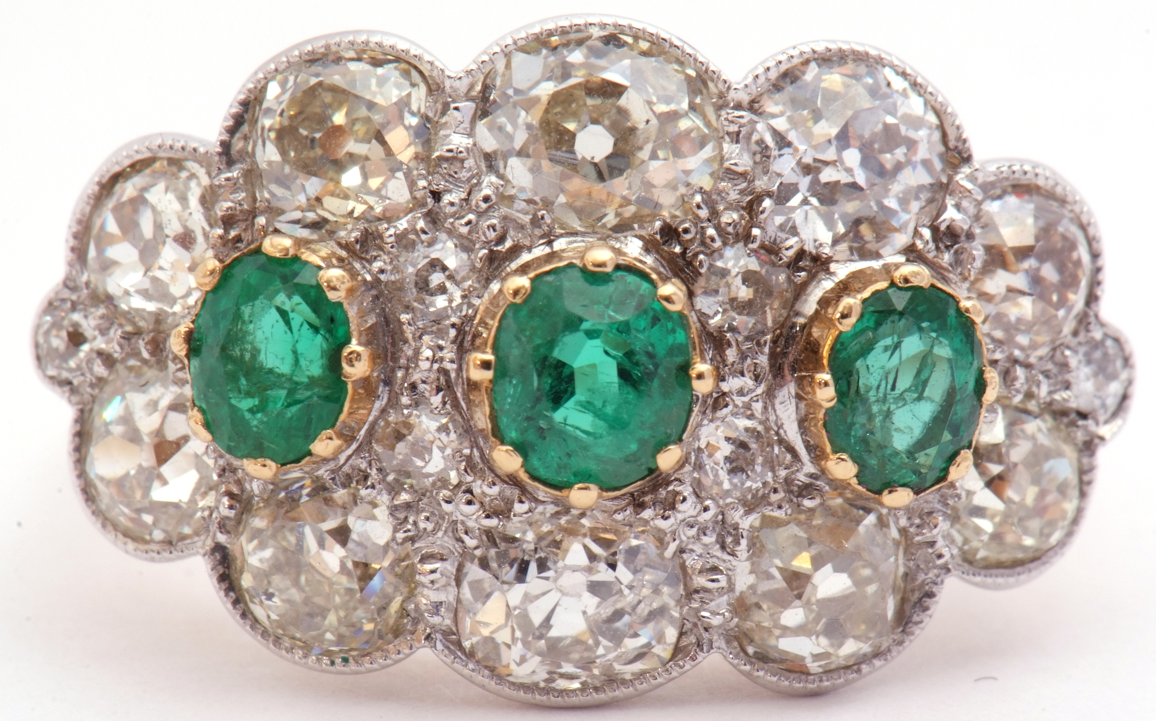 Large emerald and diamond cluster ring of oval design, featuring three graduated oval faceted - Image 2 of 9