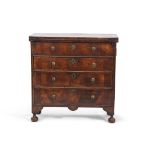 17th century walnut chest with fold-top over two slides, fitted below with a dummy drawers over