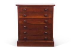 Victorian mahogany specimen cabinet fitted with six glass lined drawers on a plinth base, 38cm wide