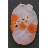 Vintage pink and orange jade pendant, a design featuring a monkey holding fruit and flowers, 5 x