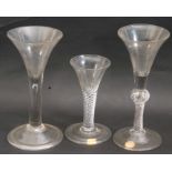 Group of 2 mid 18th century wine glasses, one air twist with knop and second with small teardrop
