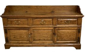 18th century oak dresser base with later tray top pediment, the frieze with three short drawers over