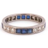 Precious metal, sapphire and diamond full eternity ring, alternate set with three calibre cut square