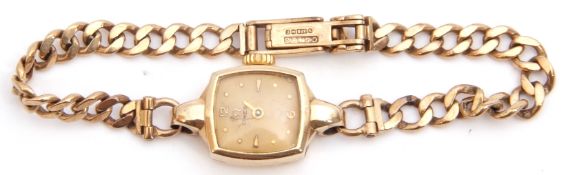 Hallmarked 9ct gold ladies Omega wrist watch mounted on a hallmarked 9ct gold flattened curb link