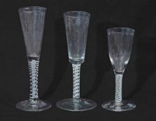 Three 18th century air twist glasses, tallest 19cm (3)