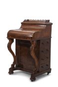 Victorian walnut piano top Davenport, rising spring loaded stationery compartment, fret carved