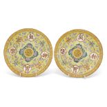 Pair of Chinese porcelain late Qing dynasty yellow ground plates with Buddhistic symbols and