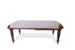 Victorian mahogany wind-out extending dining table, rounded corners and moulded edge raised on